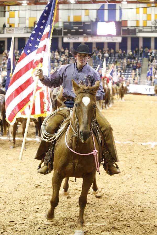Last year’s top hand, Jack Mitchell of the Crutch Ranch, presented the American flag to a standing ovation.