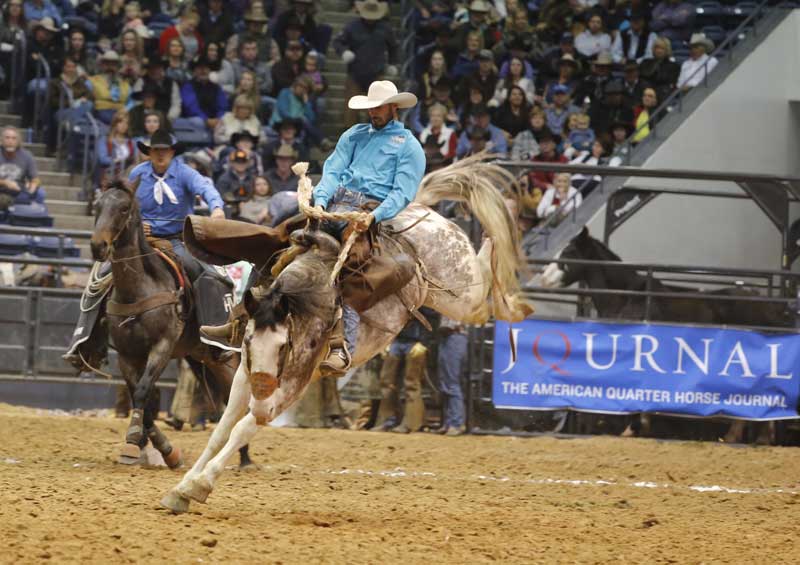 Kyle McCauley of the JO Bar Ranch & Hatchet Ranch team rode an explosive bronc to a score of 70 Saturday night. That currently ties them for third in the average.